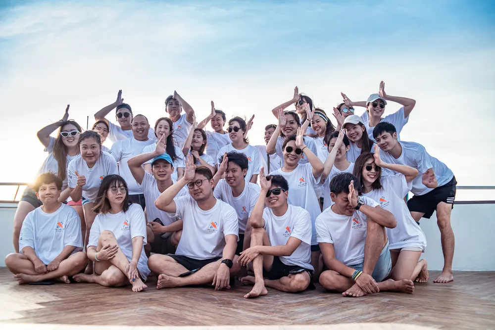 Team photo against the sky